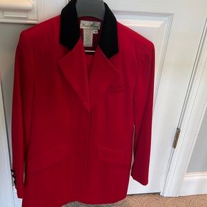 Classy and feminine red suit jacket and A line skirt. Black trim collar, buttons